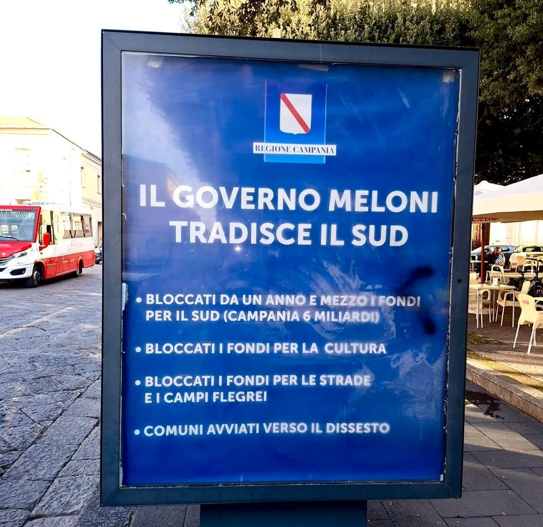 manifesti contro fdi regione polemica